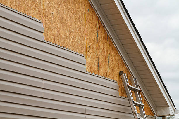 Professional Siding Installation technician working in Burnham, PA